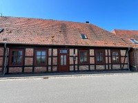 Hauptbild Ursprünglicher Backsteinbau mit Blick auf Schloss Basedow und den Schlossteich...